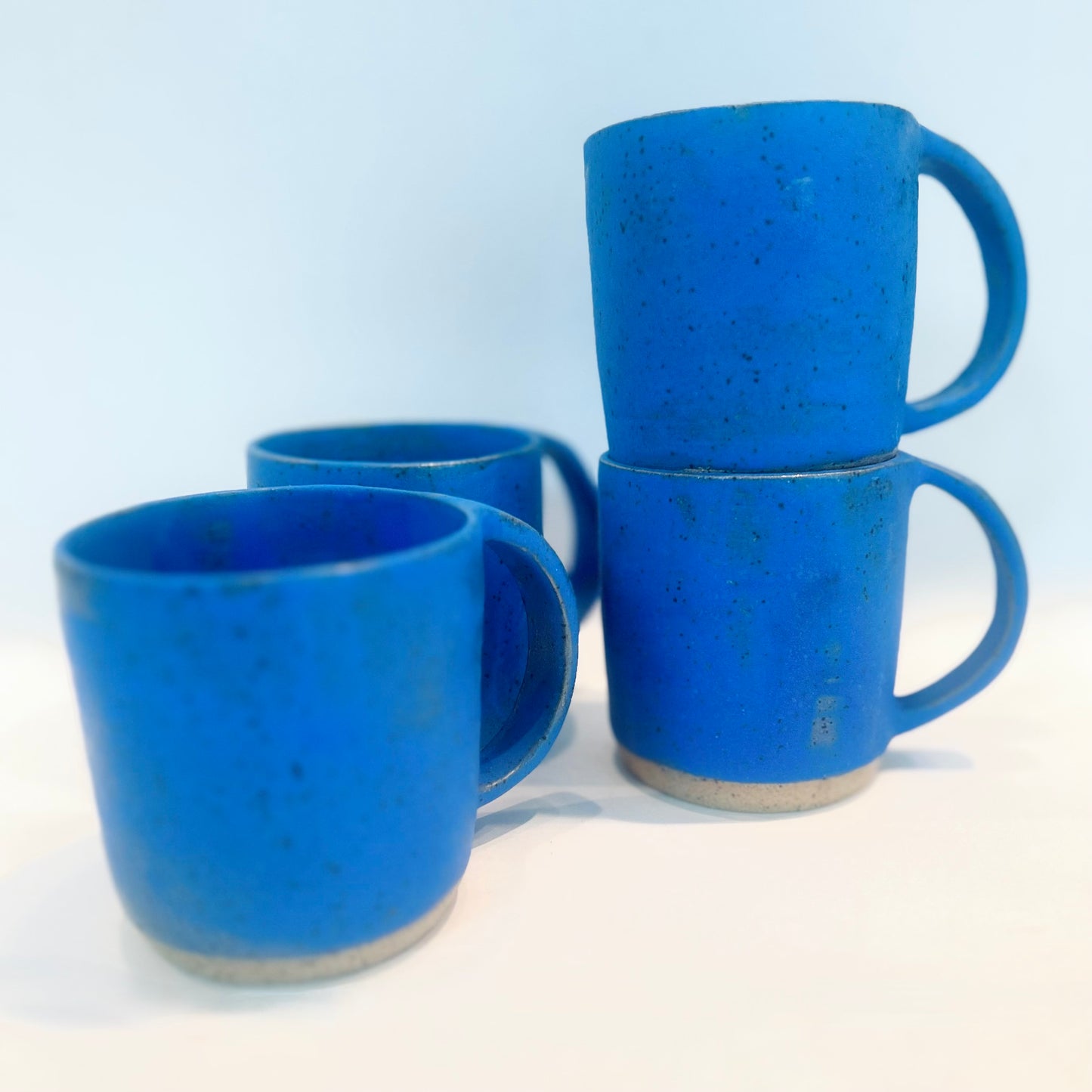 worn blue jean mugs